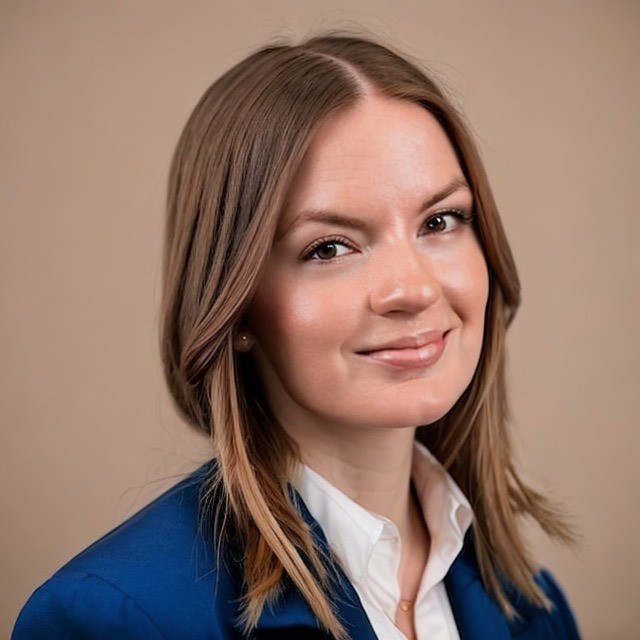 Head shot of young woman with brown hair